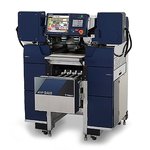 Machines for packing in trays